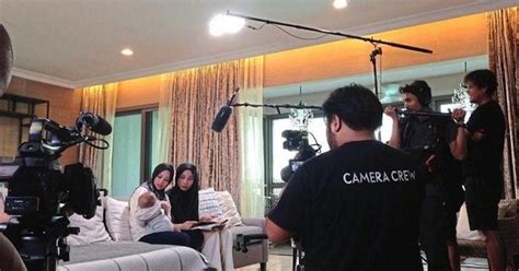 Reality show set with cameras and crew