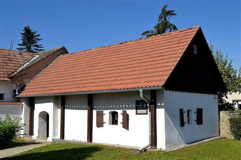Dom s predajnou tabuľou