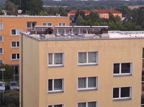 Panelák s rekonštruovanou strechou