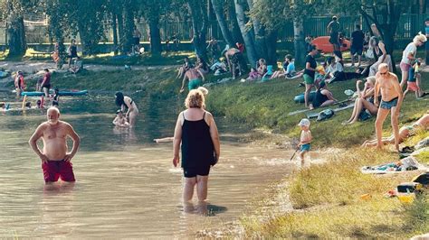 Fotografia jazera Draždiak s ľuďmi relaxujúcimi pri vode