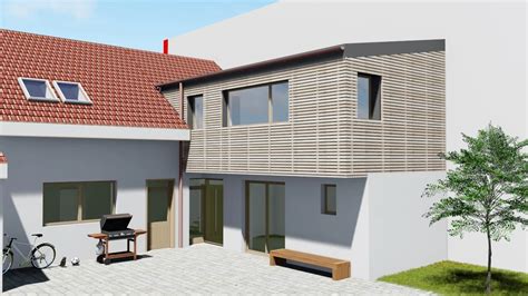 Architekt navrhujúci prístavbu k rodinnému domu
