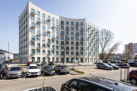 Moderná architektúra bytového domu na Muchovom námestí
