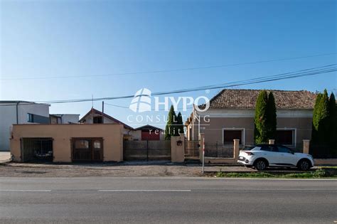 Ikona znázorňujúca kľúč a dom, symbolizujúca investíciu do nehnuteľnosti