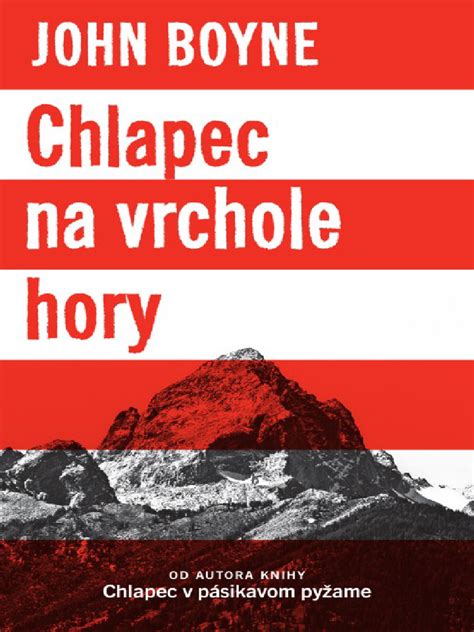Muž stojaci na vrchole hory s výhľadom na údol