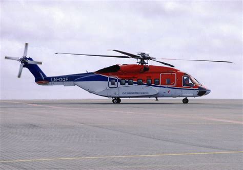 Helikoptéra s visiacim športovcom