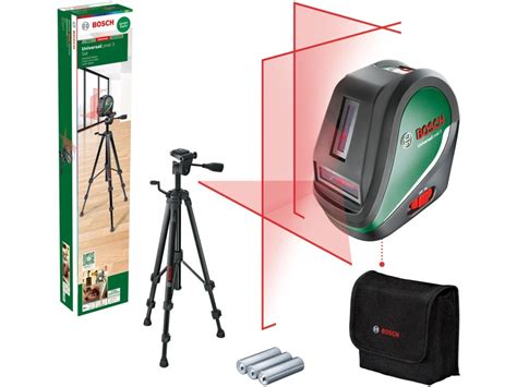 Stavebný laser premietajúci zelené čiary na stenu.