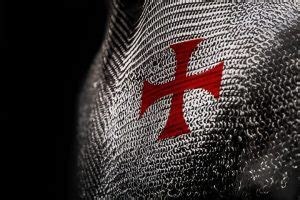 Symbol templárov - biely plášť s červeným krížom