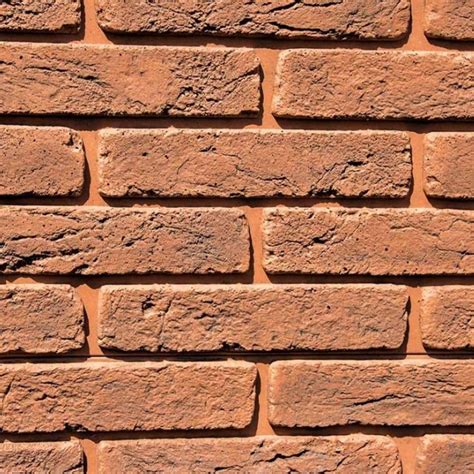 Rôzne typy stavebných materiálov pre garáže: Tehla, betónový blok, drevený trám