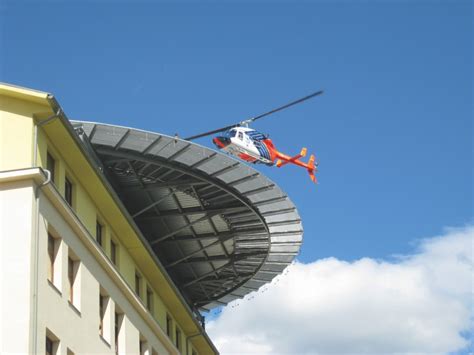 Vizualizácia heliportu na streche modernej budovy