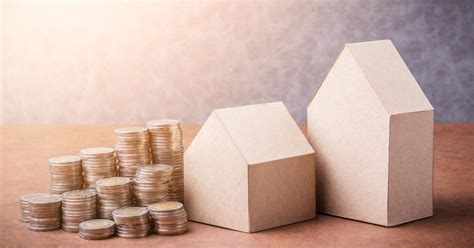 Symbolické znázornenie investície do nehnuteľnosti