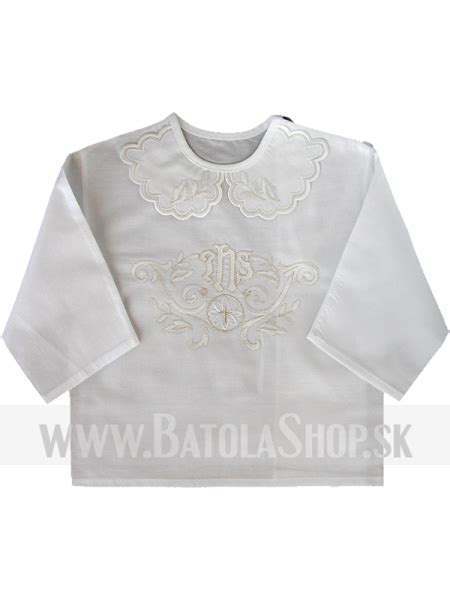 Symbol krstu - biela košieľka a svieca