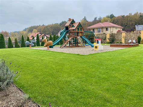 Záhrada apartmánu Alenka s grilom a detským ihriskom