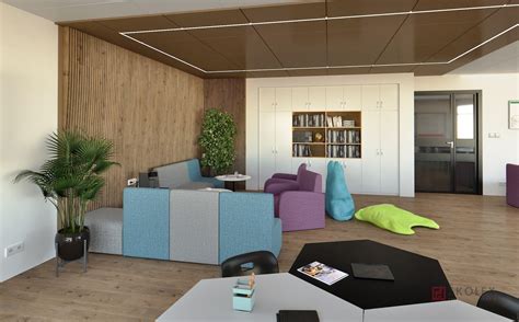 Interiér modernej kancelárie s otvoreným priestorom a oddychovou zónou