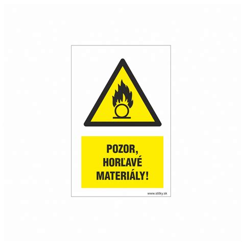 Štítky upozorňujúce na horľavé materiály v sklade garáže