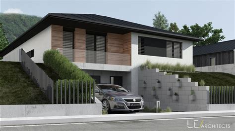 Pohľad na rodinný dom vo svahu s drevenou fasádou