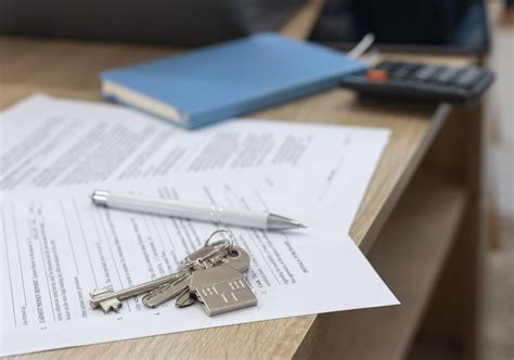 Symbol znázorňujúci predaj nehnuteľnosti a poradenstvo